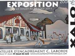 photo de exposition huiles de Xalo Pelote et xistera de la côte basque